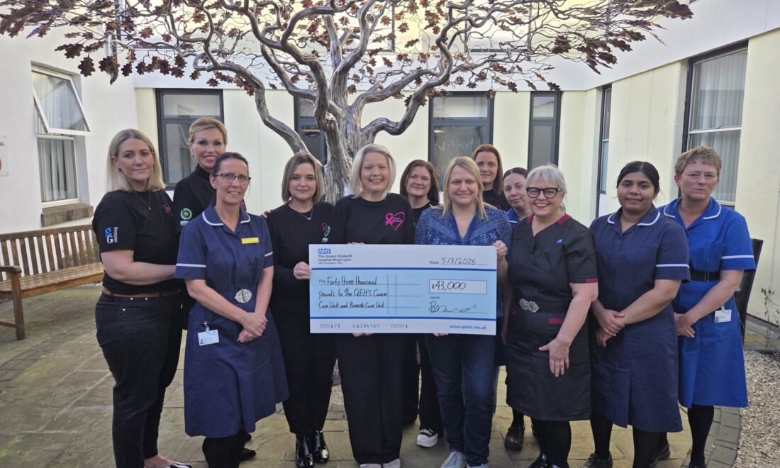 Breast of friends representatives presenting a giant novelty cheque worth £43,000 to Interim Chief Nurse Dawn Collins and other staff nurses